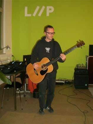 Tinu playing the bass