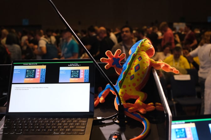 DrupalCon Barcelona Mascot watching the crowd